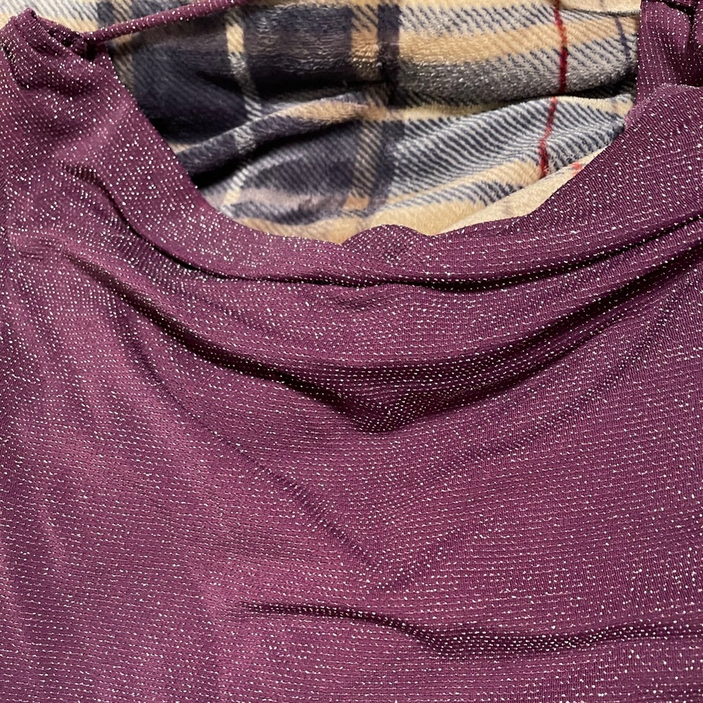 Sleeveless top. Glittery.